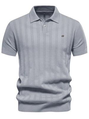 Gray ribbed knit polo shirt with vertical texture detail and short sleeves.