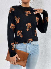 Black knit sweater with allover mushroom print, crew neck, and drop shoulders.