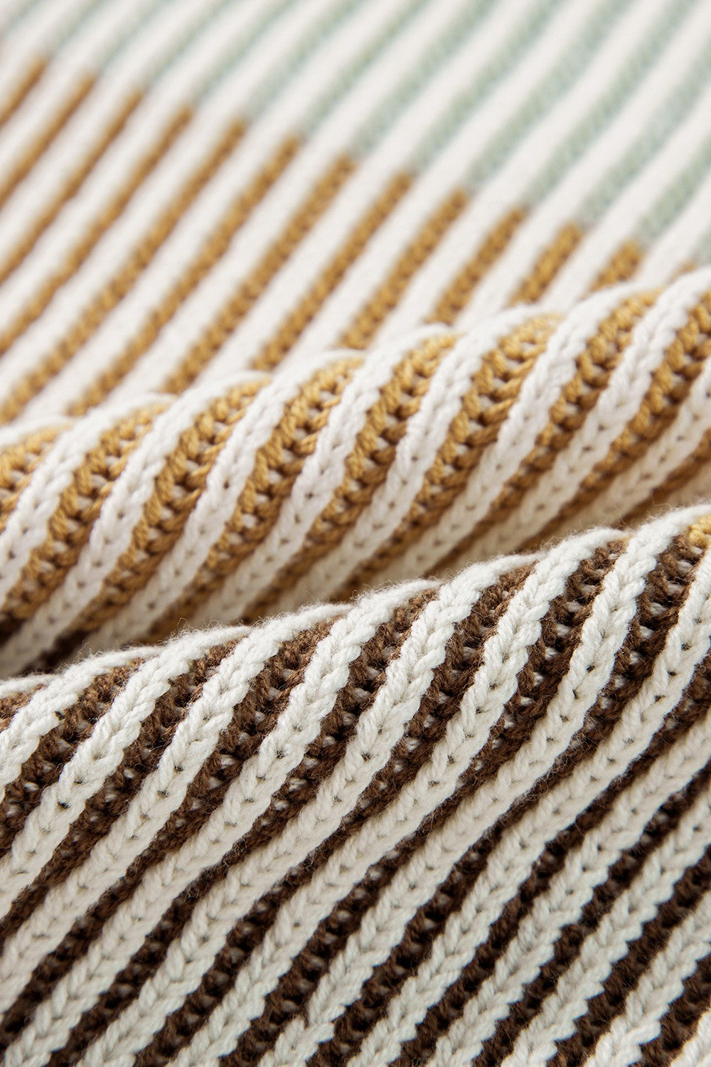 Ribbed knit sweater with brown and tan stripes, acrylic material.