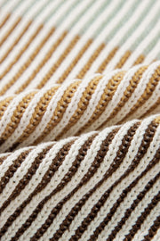 Ribbed knit sweater with brown and tan stripes, acrylic material.