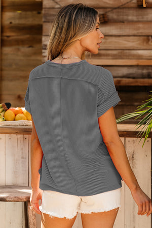 Dark gray textured ribbed tee with rolled sleeves and a casual fit.