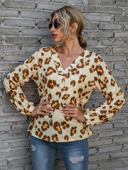 Brown leopard print henley blouse with blouson sleeves and button detail