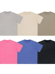 Raw seam washed cotton tees in black, gray, beige, blue, and hot pink.