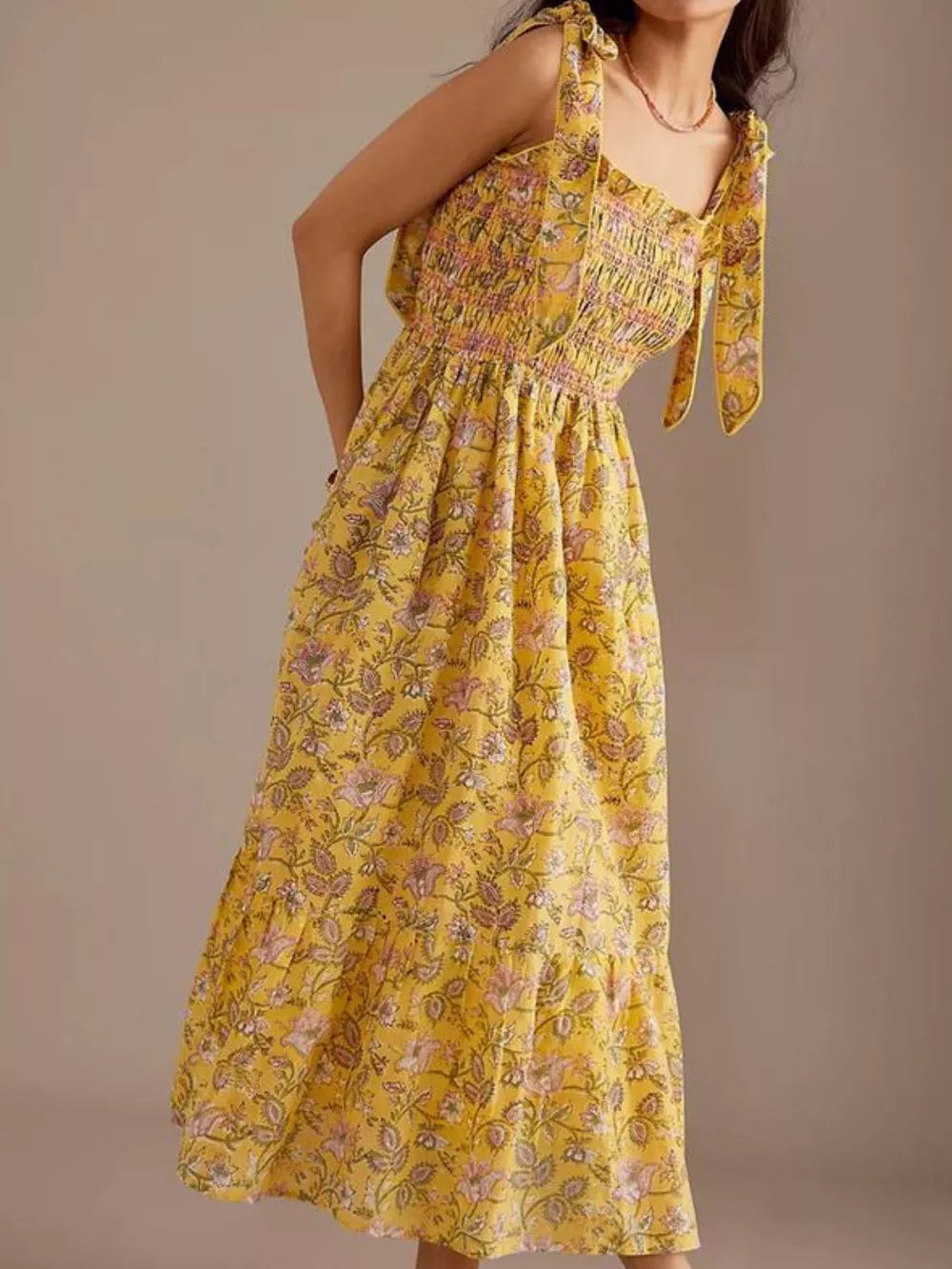 Yellow floral midi dress with smocked bodice and tie shoulders