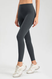 Dark Gray high-waist performance leggings with sculpting seams, full length.