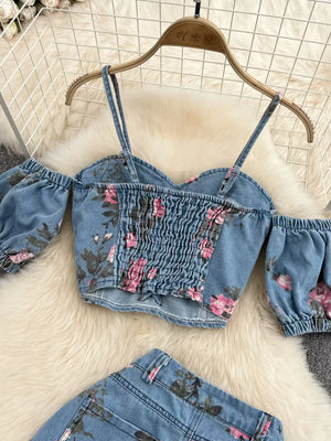Denim sweetheart cami with floral print and smocked front, paired with matching denim shorts.
