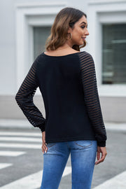 Black sheer stripe raglan sleeve top with scoop neck.