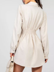 Apricot pinstripe mini dress with button detail and cinched waist