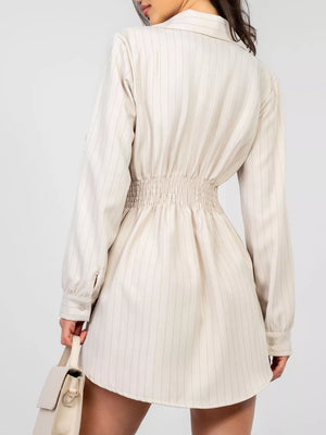 Apricot pinstripe mini dress with button detail and cinched waist