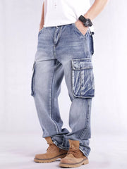 Relaxed fit light wash denim cargo jeans with flap pockets and contrast stitching.