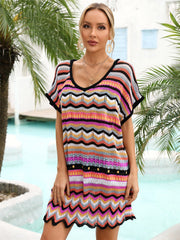 Chevron knit beach cover-up with multicolor zigzag pattern and black trim.