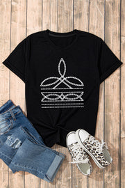 Black crew neck t-shirt with white embroidered graphic detail and rolled sleeves.