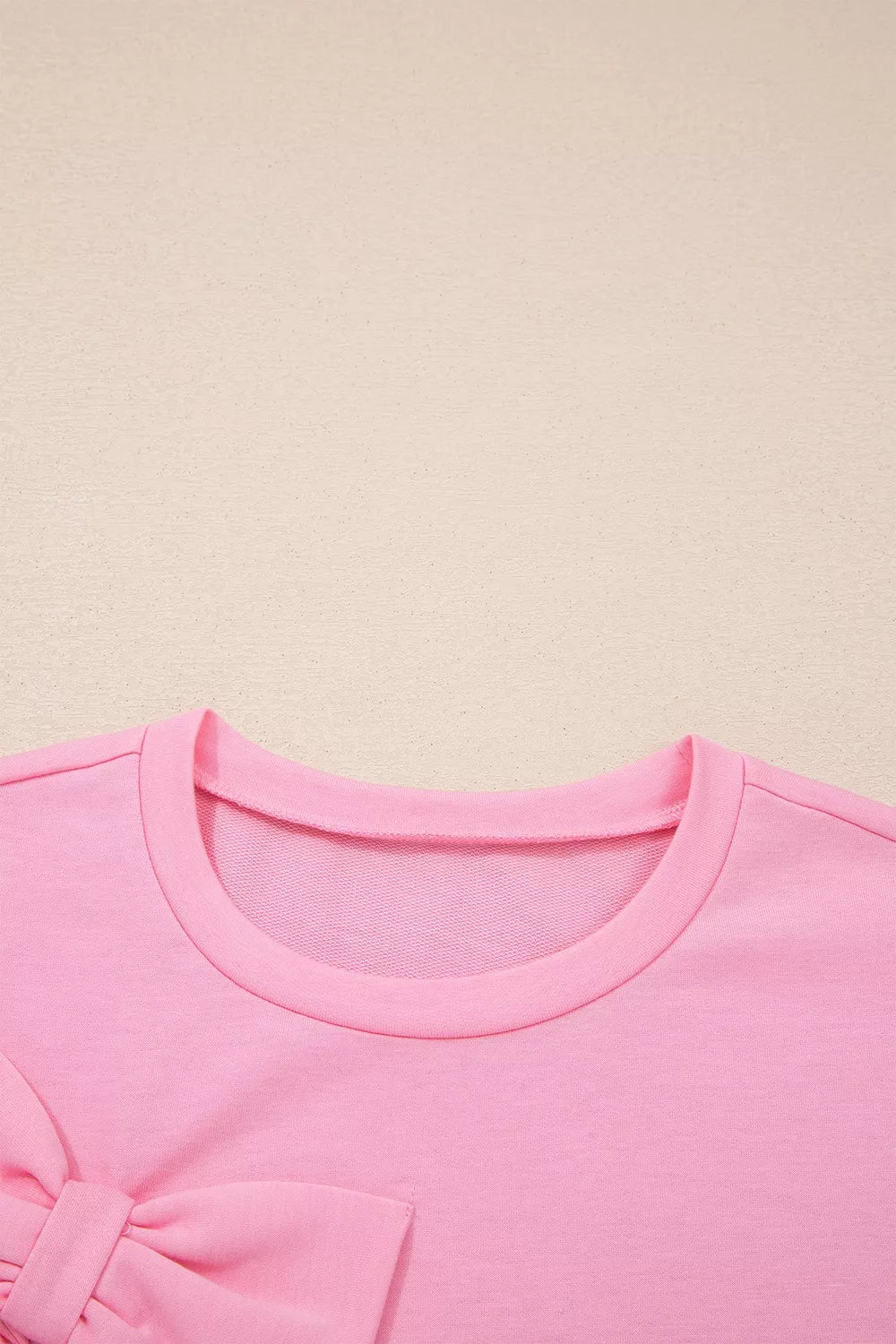 Solid Color Raw Edge Bow Patch Loose T Shirt in Pink, back view