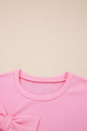 Solid Color Raw Edge Bow Patch Loose T Shirt in Pink, back view
