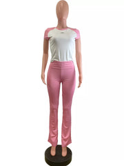 Pink and white contrast tee and pants set with a body-hugging fit.