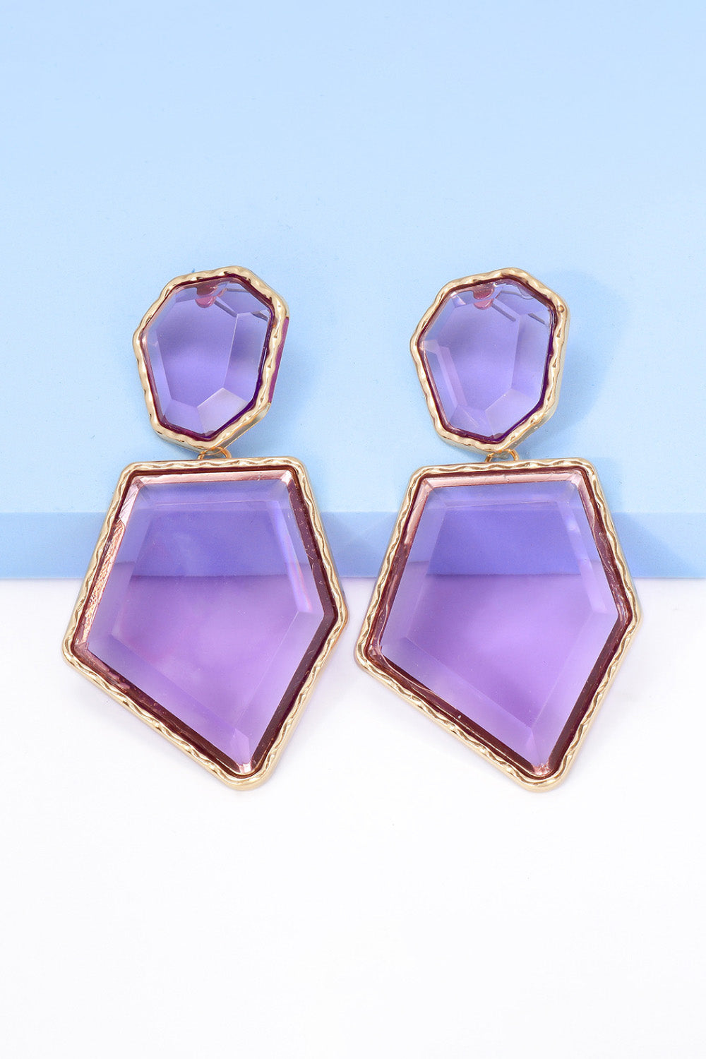 Resin facet drop earrings with gold trim in Red-Violet.