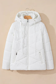 Glossy white quilted puffer jacket with a hood and zippered pockets.