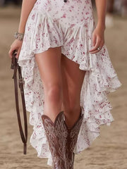 White floral high-low ruffle hem dress with layered ruffles and a short hemline.
