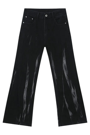 Faded flare denim jeans in dark wash with vertical distressed detailing.