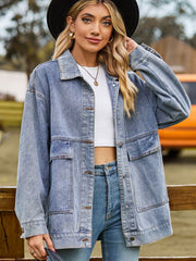 Oversized light wash denim trucker jacket with collared neck and chest pockets.