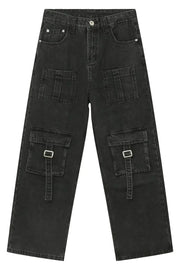 Dark utility denim cargo pants with buckle strap pockets and wide leg cut.