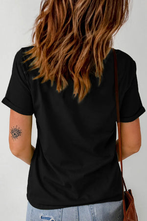 Black graphic tee with short sleeves and a rolled cuff, featuring a leopard-print "Thankful" design.