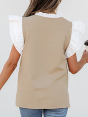 Khaki blouse with contrast white ruffle sleeves and collar detail.