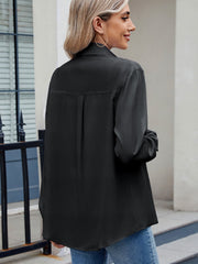 Black utility crepe shirt with tie detail, long sleeves, and back pleat detail.
