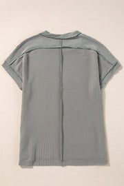 Dark Gray vertical stripe t-shirt with a collared neckline and short sleeves.