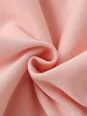 Kids' cotton sweatshirt in watermelon pink, showing textured fabric detail.