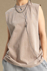 Washed cotton muscle tank in khaki with raw hem and crew neck.