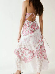 Maxi dress with pink floral print, lace trim, and open back.