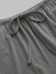 Grey drawstring pants with elastic waistband detail