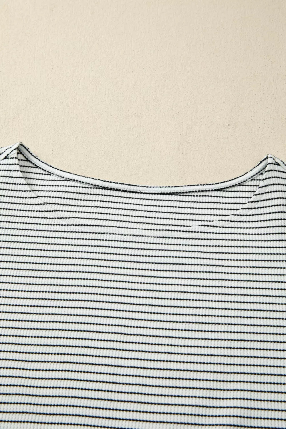 Ruffled stripe detail casual tank top with a scoop neckline in polyester.