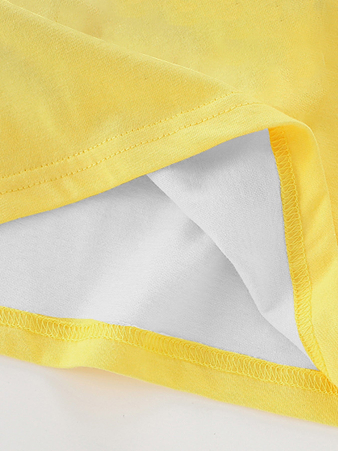 Yellow toddler t-shirt with crew neck and double-stitched hem detail.