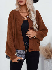 Brown ribbed knit button-up cardigan with round neckline and balloon sleeves.