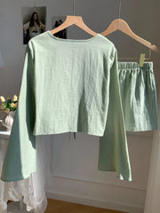 Light green cotton tie-front top with wide sleeves and matching shorts set