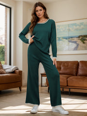 Dark green acrylic sweater set with contrast trim, crew neck, long sleeves, and wide-leg pants.