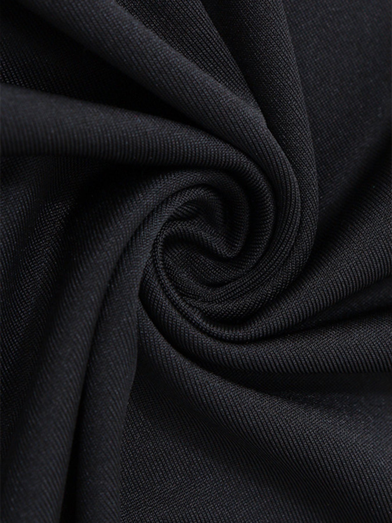Black ribbed knit mini dress fabric detail