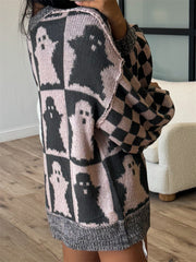 Ghost checkered knit sweater in dusty pink and black with ghost pattern and checkered sleeves.