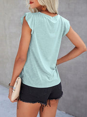 Light blue cotton eyelet yoke flutter sleeve top with a crew neck.