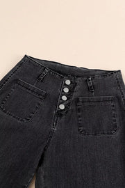 Black denim wide-leg jeans with button-fly and patch pockets.