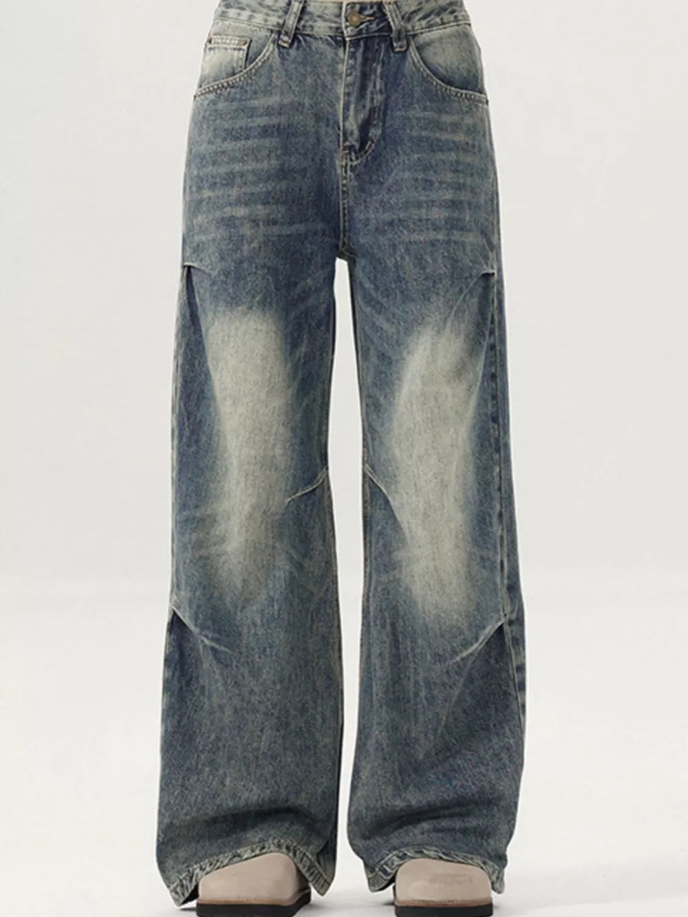Men's vintage-inspired wide-leg jeans in distressed blue denim with a baggy fit.