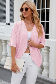 Blush pink open-front crochet kimono top with short sleeves and a relaxed fit.