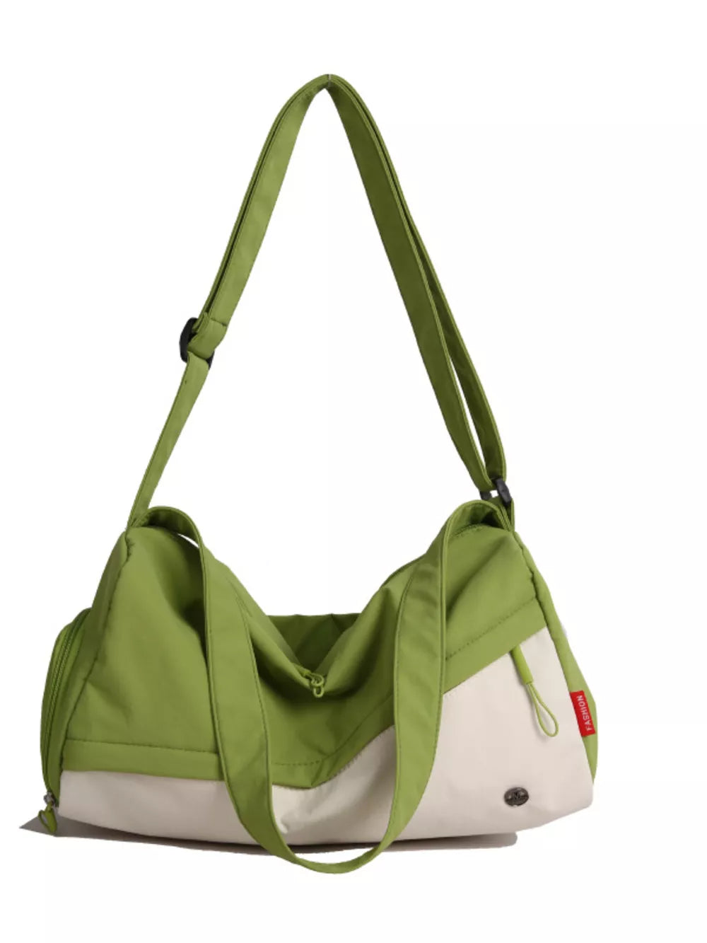 Color-block nylon travel bag in green and cream with adjustable strap and zipper closure.