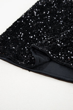 Black sequin mini skirt with body-hugging fit and smooth lining detail.
