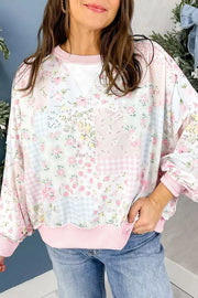 Twisted Ribbed Trim Floral Print Sweatshirt in Blush Pink, model styling view