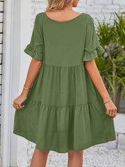 Army green tiered mini dress with ruffled short sleeves and scoop neck.