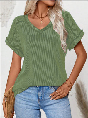 Matcha green ribbed V-neck t-shirt with cuffed short sleeves and contrast stitching.
