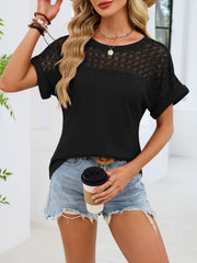 Black waffle knit t-shirt with eyelet detail on yoke and sleeves.